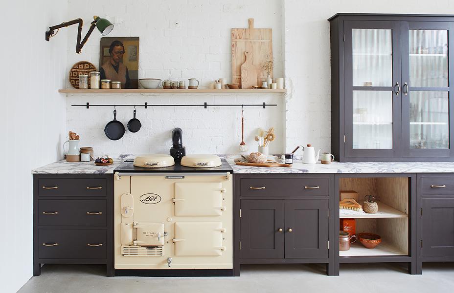  black kitchen with marble top and beautiful objects