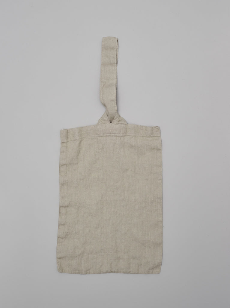 Flat lay of linen bread bag in natural