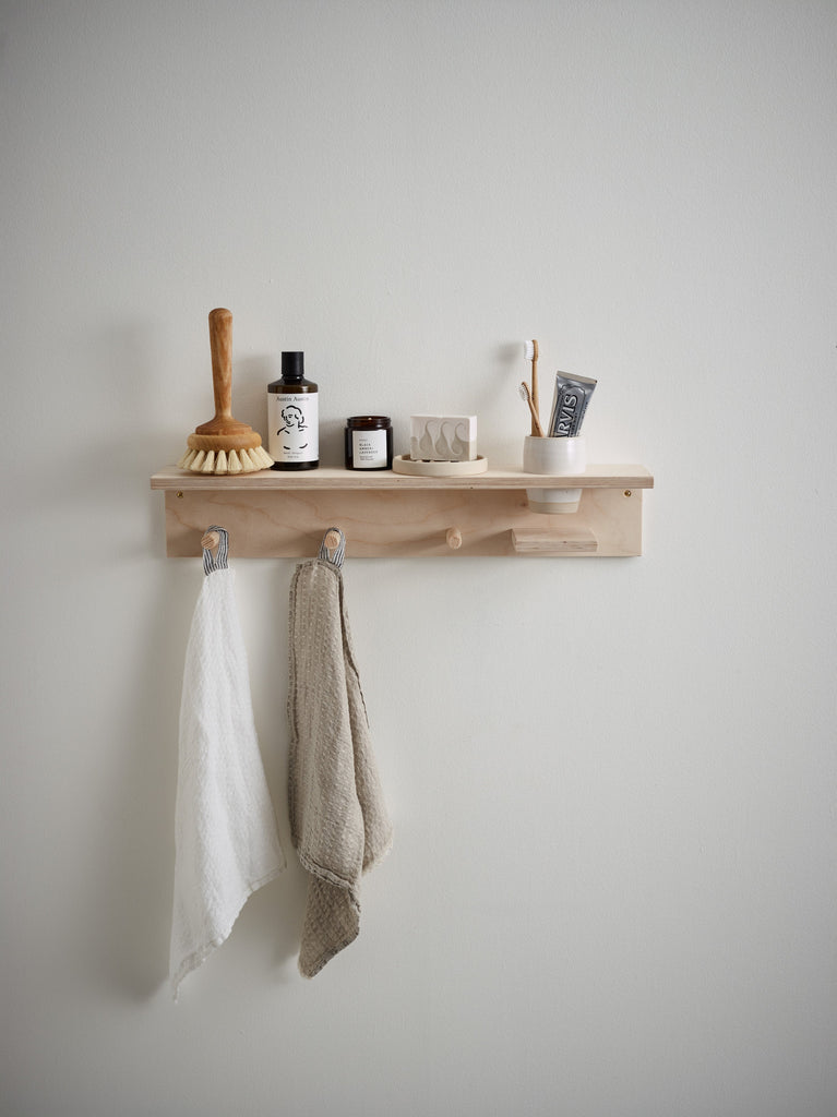 object story bathroom shelf calm neutral styling